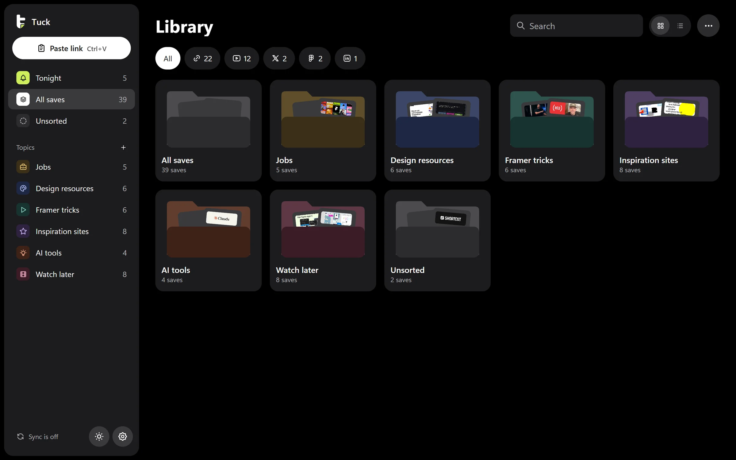 Tuck for Windows in dark mode, the library: seven topic folders in soft colours, each holding the covers of its saves.