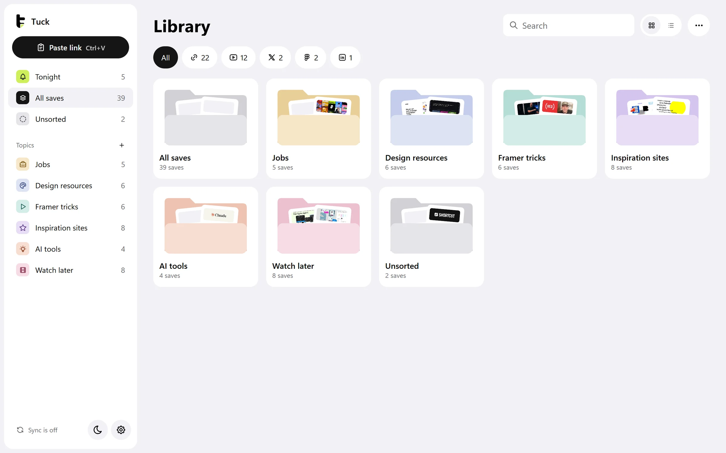 Tuck for Windows, the library: topic folders in soft colours, each holding the covers of its saves, with filters by site along the top.